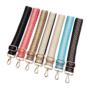 Set of seven colorful jacquard woven shoulder straps with adjustable gold metal hardware