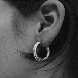 Chunky S925 sterling silver hoop earrings with a polished mirror finish for women