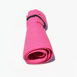 Pink straw sun visor hat with rollable design for travel shown on white background