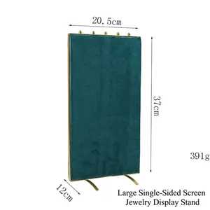 Green velvet jewelry stand with gold metal frame for earring display, 37cm high
