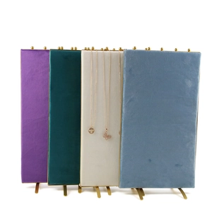 Elegant velvet jewelry display stands with gold metal frames in four assorted colors