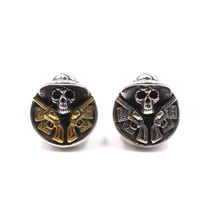 Vintage gothic skull and dual revolvers ring in antique silver and gold stainless steel