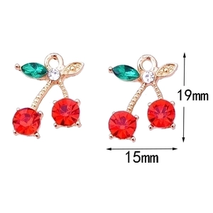 Red cherry pendant with gold metal and zircon stones in a 19mm x 15mm size