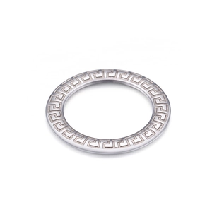 Detailed view of silver titanium steel ring with engraved classic Greek key pattern