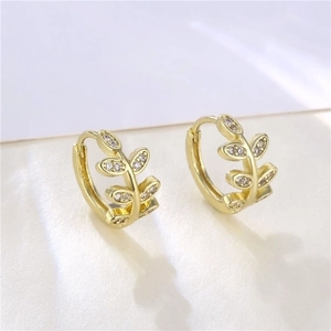 Elegant gold leaf hoop earrings with shimmering white zircon stones for women