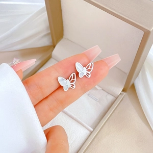 Minimalist titanium steel butterfly stud earrings with iridescent mother of pearl inlay