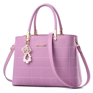 Purple embroidered leather tote bag with pearl pendant and adjustable shoulder strap
