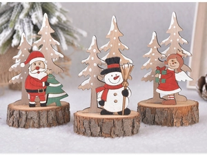 Detailed view of hand-painted wooden Christmas tree ornaments with Santa and Snowman