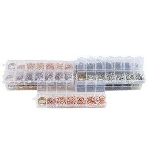 DIY jewelry making kit with colorful jump rings in a transparent multi-grid storage box
