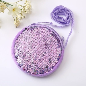 Detail of purple sequin crossbody bag with soft faux fur trim and adjustable strap