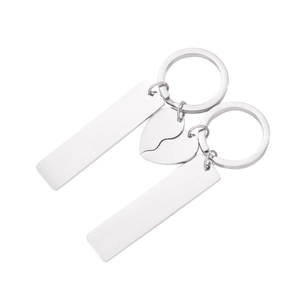 Polished stainless steel couple keychain set with interlocking heart and bar pendants