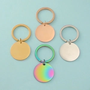 Polished round stainless steel keychains in gold, rose gold, silver and rainbow finishes