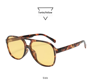 Side view of retro tortie aviator sunglasses featuring yellow transparent lenses