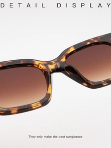 Detailansicht der Sonnenbrille mit Schildpatt-Rahmen und braunen Verlaufsgläsern im Fokus