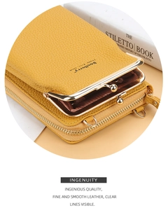 Detail of yellow lychee grain PU leather phone bag with gold metal kiss lock closure