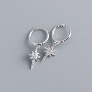 Close-up of S925 silver star hoop earrings with sparkling cubic zirconia star pendants