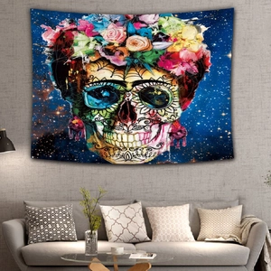 Detailed view of Frida style skull tapestry with vibrant flowers against starry night background