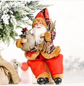 Detailed close-up of Santa Claus figurine with red plaid coat and festive accessories