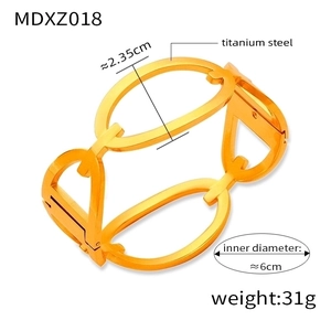 Detail showing titanium steel gold plated hollow geometric bracelet with dimensions