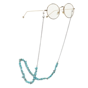 Fashionable gold frame eyewear with turquoise bead silver chain on white background