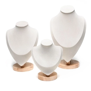 Three-piece solid wood and cream velvet bust stands for necklace and jewelry display