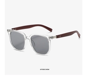 Detailed 45-degree side view of transparent square sunglasses with dark wood grain temples