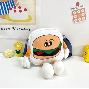 Close-up of canvas bag with 3D cartoon burger character and soft plush limbs detail
