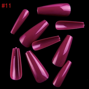 Macro detail of glossy rose purple coffin shape press on nails with size numbers
