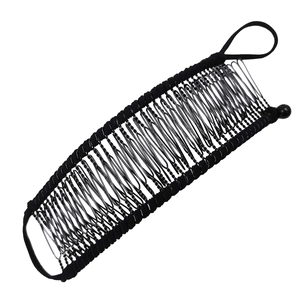 Detail view of a black fabric-wrapped banana hair clip with metal wire comb structure