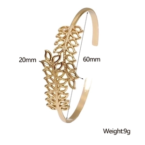 Detail view of gold leaf hollow cuff bracelet with 60mm diameter and 20mm width