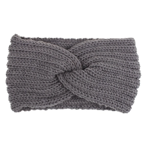 Close-up of thick dark grey cable knit pattern on a twisted winter headband for women