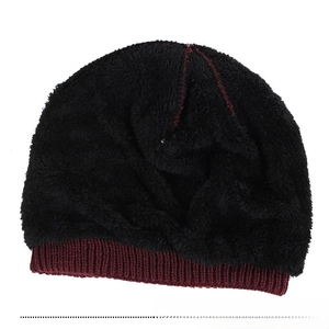 Detail showing the thick black fleece lining inside the knitted beanie for warmth
