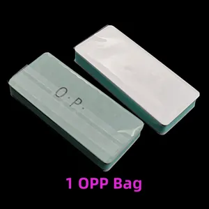 Macro shot of double-sided nail buffer in individual OPP packaging showing O.P. logo