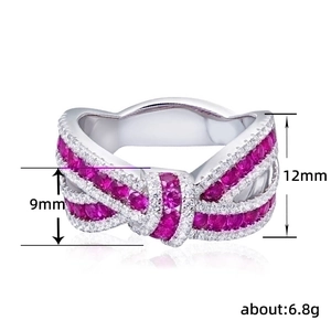 Elegant silver ribbon twist ring with pink pave stones, 9mm width fashion jewelry