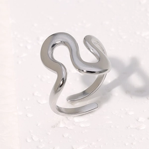Irregular wave pattern open ring in silver finish with polished stainless steel texture