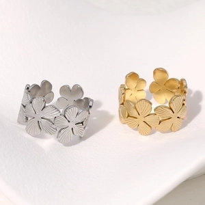 Adjustable stainless steel floral relief rings in gold and silver finish with petal texture