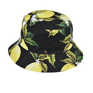 Detail of black cotton bucket hat featuring vibrant yellow lemon and floral print
