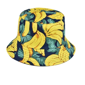 Close-up of high-quality canvas bucket hat with vibrant yellow banana print pattern