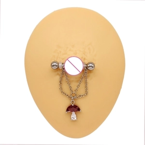 Detail of mushroom pendant nipple ring with silver chain and red crystal on silicone mold