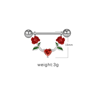 Detailed view of red rose nipple ring featuring a heart-shaped zircon and 15mm bar