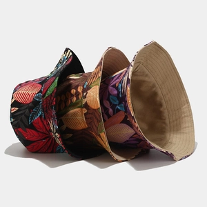 Reversible tropical print bucket hat for women in canvas with three floral patterns