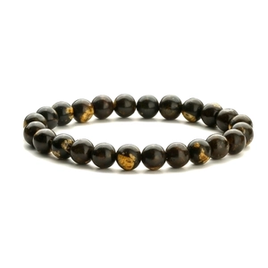 Macro detail of natural tiger eye and lava stone beads with brown texture on elastic bracelet