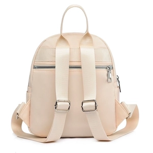 Zaino minimalista da donna in nylon beige con tasca antifurto e spallacci regolabili