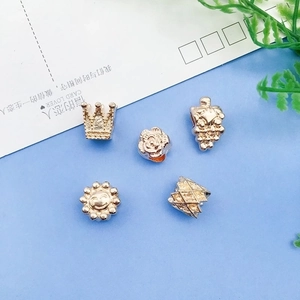 KC gold alloy spacer beads featuring crown rose and sun shapes for DIY jewelry making