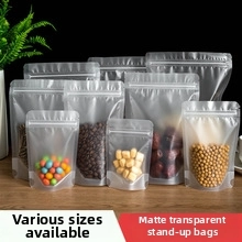 Frosted self-standing kraft bags in various sizes filled with nuts, coffee, and dried fruit