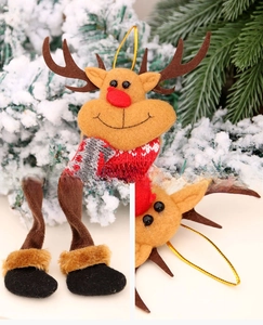 Close-up of reindeer plush ornament with knitted scarf and long legs for Christmas tree