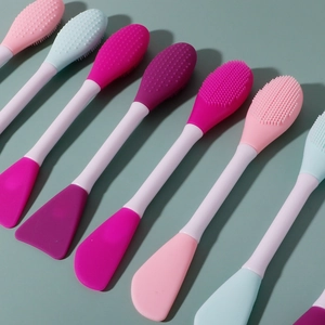 Dual-ended silicone face mask brush for application and cleaning in multiple colors
