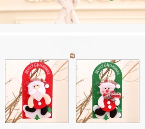 Close-up of Santa and Snowman non-woven door hangers with Merry Christmas greetings