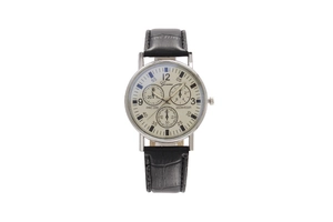 Detail view of quartz watch with cream dial, chronograph display and black leather strap