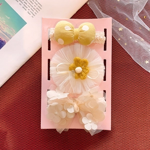 Detailed set of 3 yellow and white baby headbands with floral and lace bow designs
